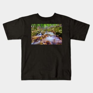 River flowing through rocks Kids T-Shirt